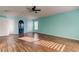 Primary bedroom with hardwood floors and multiple closets at 11309 Outrigger Ave, Spring Hill, FL 34608