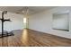 Spacious bedroom with wood floors and ample closet space at 11309 Outrigger Ave, Spring Hill, FL 34608
