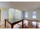 Open concept living space with hardwood floors and a view of the kitchen at 11309 Outrigger Ave, Spring Hill, FL 34608