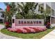 Community entrance with attractive landscaping and signage at 1623 Sea Haven Dr # 301, Punta Gorda, FL 33950