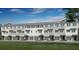 Modern townhome community with attached garages and attractive landscaping at 1623 Sea Haven Dr # 301, Punta Gorda, FL 33950