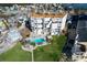 Great aerial view of this condo building with community pool, lush landscaping, and fantastic views at 17980 Gulf Blvd # 103, Redington Shores, FL 33708
