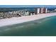 Aerial view of beachfront property with manatees at 17980 Gulf Blvd # 103, Redington Shores, FL 33708