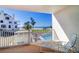 Enjoy ocean views from this condo's private balcony with a lounge chair at 17980 Gulf Blvd # 103, Redington Shores, FL 33708