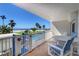 Outdoor seating on this spacious balcony provides the perfect spot to enjoy beach views at 17980 Gulf Blvd # 103, Redington Shores, FL 33708