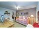 Cozy bedroom featuring a daybed and charming decor at 17980 Gulf Blvd # 103, Redington Shores, FL 33708