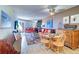 Bright condo dining area with wooden table and chairs at 17980 Gulf Blvd # 103, Redington Shores, FL 33708