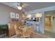 Charming dining area with a wooden table and chairs at 17980 Gulf Blvd # 103, Redington Shores, FL 33708