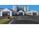 Ample parking garages, set in a manicured landscape, enhance this condo community at 17980 Gulf Blvd # 103, Redington Shores, FL 33708