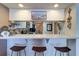 Kitchen with breakfast bar and ocean view at 17980 Gulf Blvd # 103, Redington Shores, FL 33708