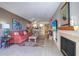 Open living area with fireplace and coastal decor at 17980 Gulf Blvd # 103, Redington Shores, FL 33708