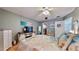 Bedroom features a ceiling fan, large closet, and beach decor at 1898 Shore Dr S # 317, South Pasadena, FL 33707