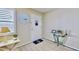 Bright condo entryway with light flooring, a console table, and beach-themed decor at 1898 Shore Dr S # 317, South Pasadena, FL 33707