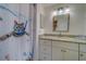 Updated bathroom with granite countertop and updated vanity at 2035 Nash Dr, Clearwater, FL 33763