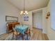 Bright dining area with a table for four and built-in shelving at 2035 Nash Dr, Clearwater, FL 33763