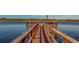 Wooden dock extending over calm lake water at 2035 Nash Dr, Clearwater, FL 33763