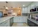 Bright kitchen, granite counters, stainless steel appliances at 2035 Nash Dr, Clearwater, FL 33763