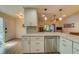 Updated kitchen featuring granite countertops and stainless steel appliances at 2035 Nash Dr, Clearwater, FL 33763