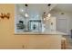 Kitchen with granite counters, stainless steel appliances, and breakfast bar at 2035 Nash Dr, Clearwater, FL 33763