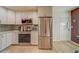 Updated kitchen with stainless steel appliances and granite countertops at 2035 Nash Dr, Clearwater, FL 33763