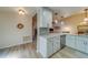 Modern kitchen with granite countertops and a breakfast bar at 2035 Nash Dr, Clearwater, FL 33763