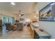 Open concept living room with a view of the kitchen and seating area at 2035 Nash Dr, Clearwater, FL 33763
