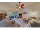 Open living room with a view into the kitchen and patio at 2035 Nash Dr, Clearwater, FL 33763