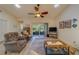 Relaxing living room with comfy seating and access to a patio at 2035 Nash Dr, Clearwater, FL 33763