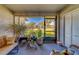 Spacious screened-in porch with view of backyard at 2035 Nash Dr, Clearwater, FL 33763