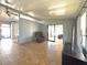 Living room with tile flooring and a comfortable recliner at 225 N Saint Thomas Cir, Apollo Beach, FL 33572