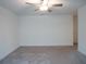 Bright bedroom with ceiling fan and neutral wall colors at 22547 Storybook Cabin Way, Land O Lakes, FL 34637