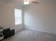 Spacious bedroom with carpeted floor and window blinds at 22547 Storybook Cabin Way, Land O Lakes, FL 34637