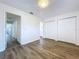 Spacious bedroom with ample closet space and hardwood floors at 22702 Penny Loop, Land O Lakes, FL 34639