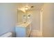 Bathroom with white vanity, double sinks, and tile floor at 2621 10Th St, Englewood, FL 34224