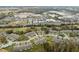 Aerial view of community near a highway and golf course at 3309 Lori Ln, New Port Richey, FL 34655