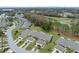 Aerial view of homes near golf course with lush landscaping at 3309 Lori Ln, New Port Richey, FL 34655