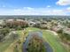Aerial view of golf course and residential community at 3309 Lori Ln, New Port Richey, FL 34655
