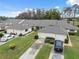 Two-unit building with attached garages and private driveways at 3309 Lori Ln, New Port Richey, FL 34655