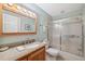 Second bathroom with granite vanity and shower/tub combo at 3309 Lori Ln, New Port Richey, FL 34655