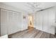 Second bedroom with double closets and wood floors at 3309 Lori Ln, New Port Richey, FL 34655