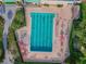 Aerial view of a community lap pool with plenty of deck space for lounging at 3309 Lori Ln, New Port Richey, FL 34655