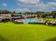 Community pool next to clubhouse at 3309 Lori Ln, New Port Richey, FL 34655