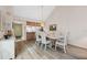 Dining room with hardwood floors and view of kitchen at 3309 Lori Ln, New Port Richey, FL 34655