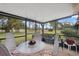 Relax in this screened porch overlooking the golf course at 3309 Lori Ln, New Port Richey, FL 34655