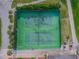 Two tennis courts, top-down view at 3309 Lori Ln, New Port Richey, FL 34655