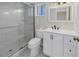 Updated bathroom with a glass shower, tile floors, and a modern vanity at 3500 Lake Bayshore Dr # K-101, Bradenton, FL 34205