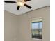 Bright bedroom with natural light and a ceiling fan, offering a comfortable and airy atmosphere at 5513 Rainwood Meadows Dr, Apollo Beach, FL 33572