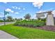 Lynewood community entrance sign with landscaping and street view at 5513 Rainwood Meadows Dr, Apollo Beach, FL 33572
