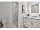 Bathroom with vanity, marble shower, and modern fixtures at 600 3Rd S Ave # 401, St Petersburg, FL 33701