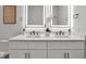 Bathroom with a double vanity, modern fixtures, and bright lighting at 600 3Rd S Ave # 401, St Petersburg, FL 33701